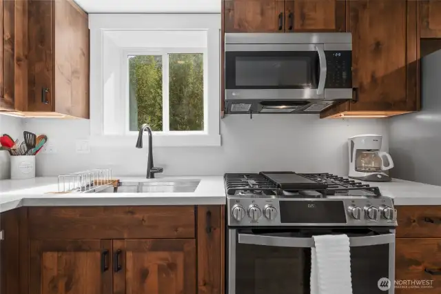 Quartz countertops and stainless appliances
