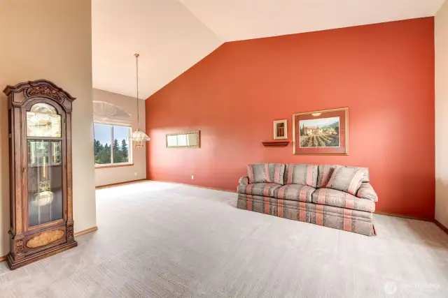 Vaulted Ceilings enhance the spacious living and dining rooms.