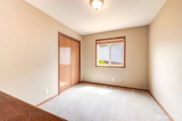 Main floor bedroom! Office or perfect for multi-generational living.