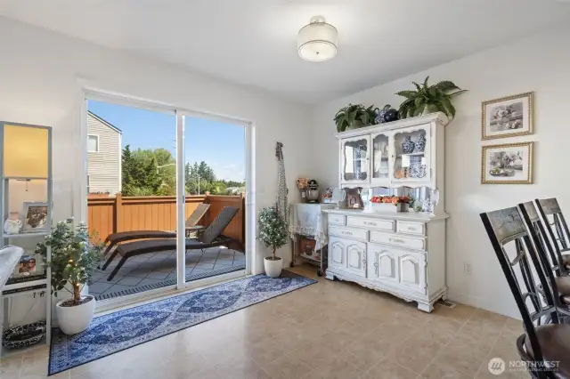 Kitchen eating area with slider to the deck