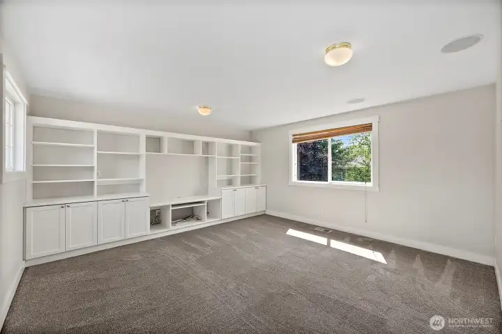 HUGE Bonus Room! Built-in Entertainment Shelving adding character and convenience