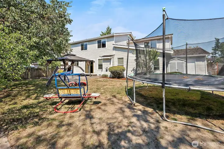 Trampoline and play set ready to enjoy and stay with the sale.
