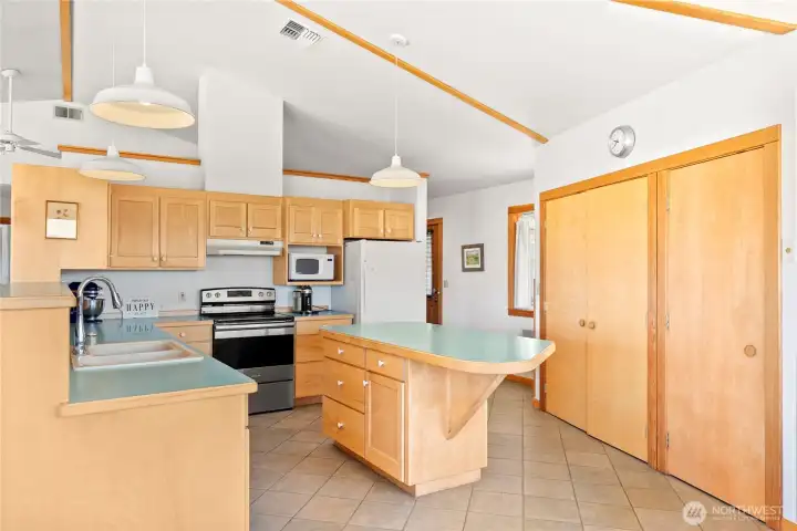 Well-designed kitchen with custom cabinetry and generous storage.