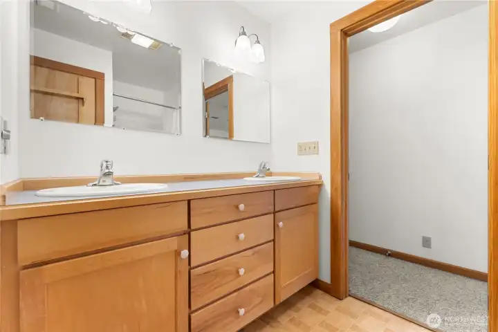 Dual vanities and His & Hers closets for comfort and convenience.