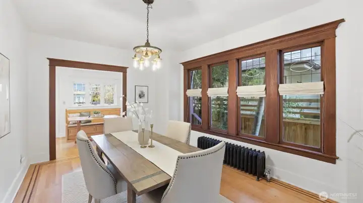 Formal dining space with original light fixture