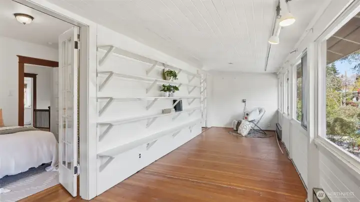 Flex space adjoining the two bedrooms on the backside of the home.