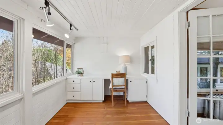 Flex space adjoining the two bedrooms on the backside of the home.