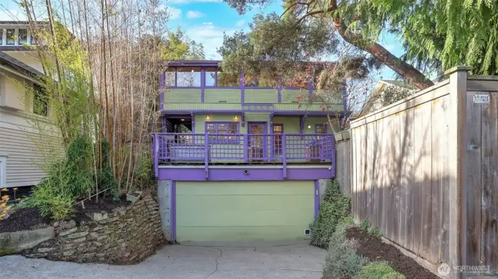 2 car attached garage with EV charging.
