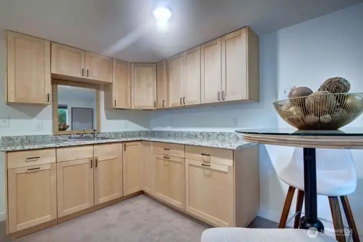 Downstairs work space with loads of storage for an office or craft space?