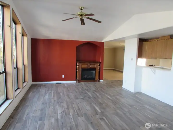 PASS THRU FROM KITCHEN AREA AND BUILT-IN ALCOVE (ELECTRIC FIREPLACE CAN STAY WITH HOME)