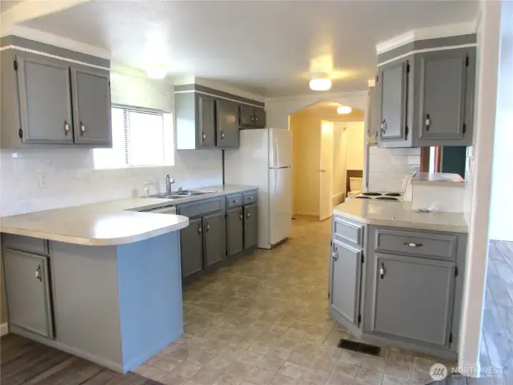 LOTS OF STORAGE IN KITCHEN.