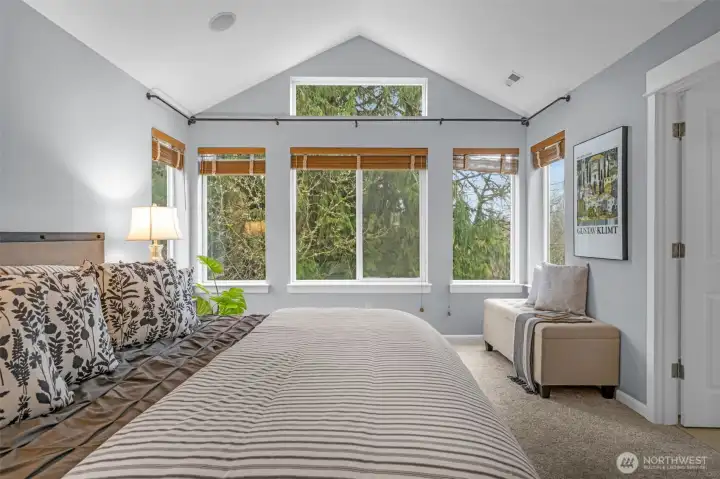 Primary bedroom with en-suite bathroom and walk-in closet.