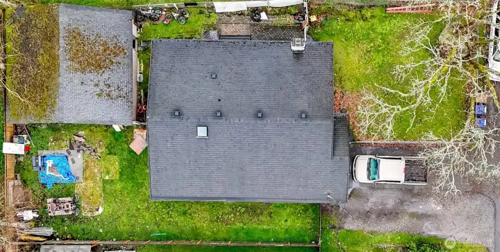 Aerial view of property with detached 2 car garage/shop. Zoned UR2