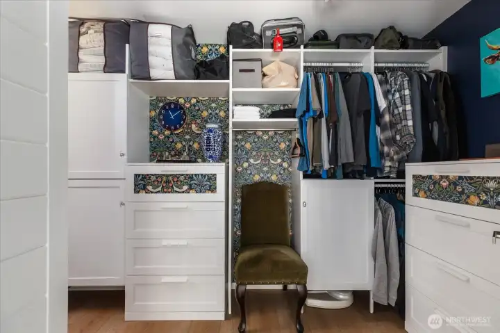 Primary's walk in custom closet system