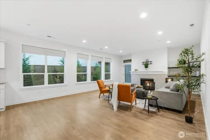 Great room, laminate floors, high ceilings, natural light