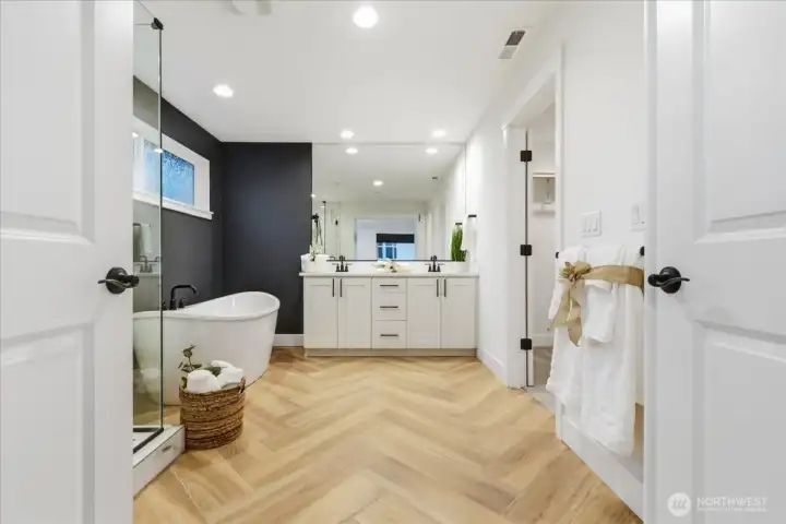 Ensuite primary bathroom, separate tub, walk-in shower, double vanity, walk-in closet