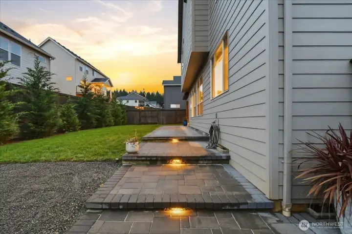 Lit path & steps, fenced backyard