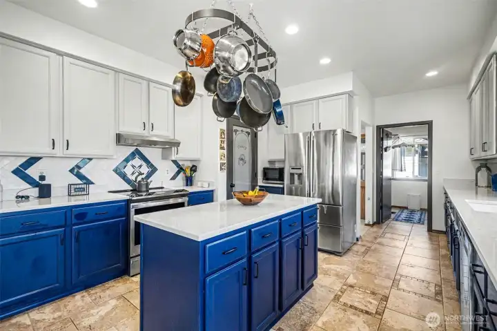 Large kitchen extends into butler's pantry and laundry room