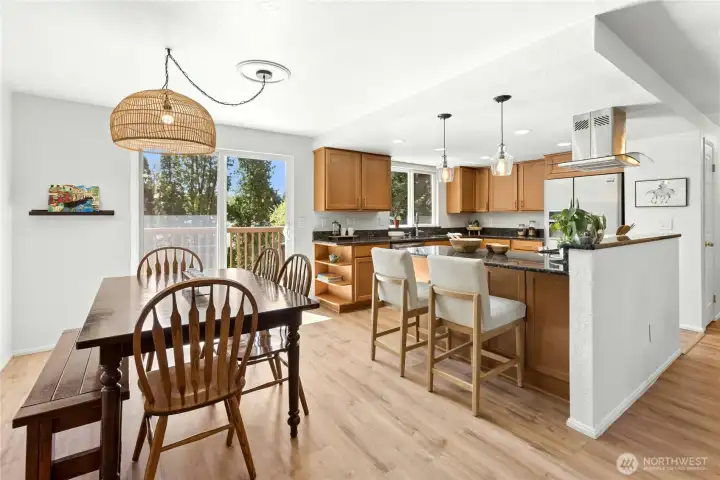 The dining room has a sliding patio door that opens to the back deck.