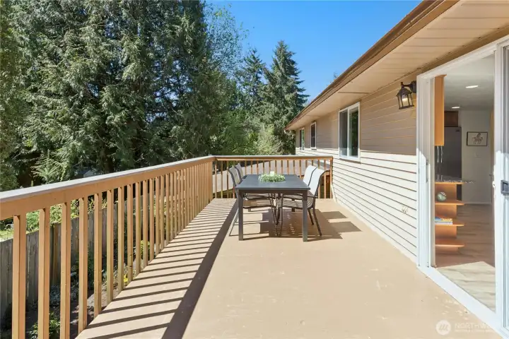 This is the back deck off the dining room and kitchen area. Bring your grill and be ready for summer BBQs!