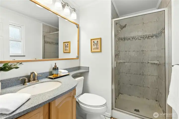 This is the primary bath with tile shower.