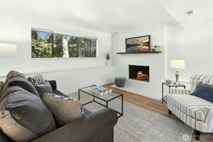 The lower level has a family room with a wood-burning fireplace.