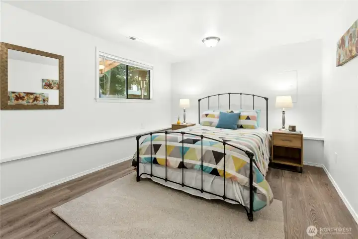 Bedroom 5 has a reach-in closet and LVT flooring as well.