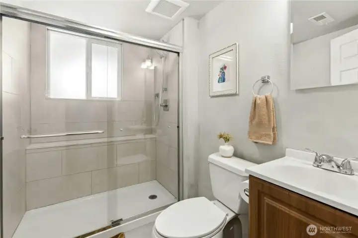 Beautifully updated 3/4 tile bath on the lower level.