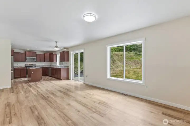 Great Room leads to kitchen and slider out to  the patio