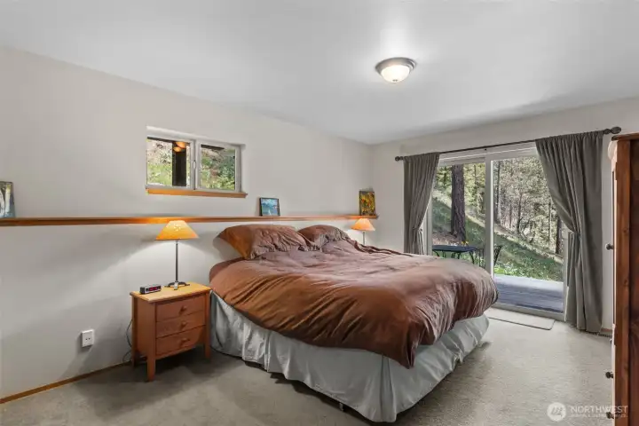 Master suite on main with slider to the master deck.