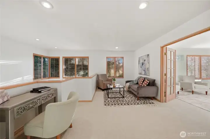 Lofted area opens to living room below.