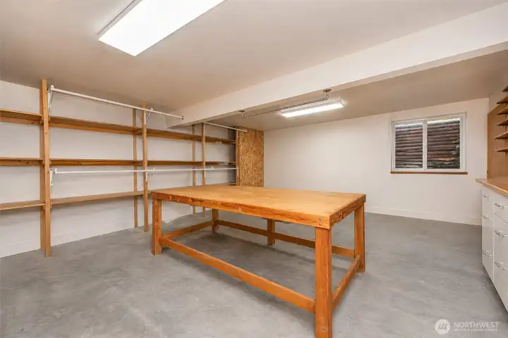 400 sf area on lower level for hobbies, storage, projects