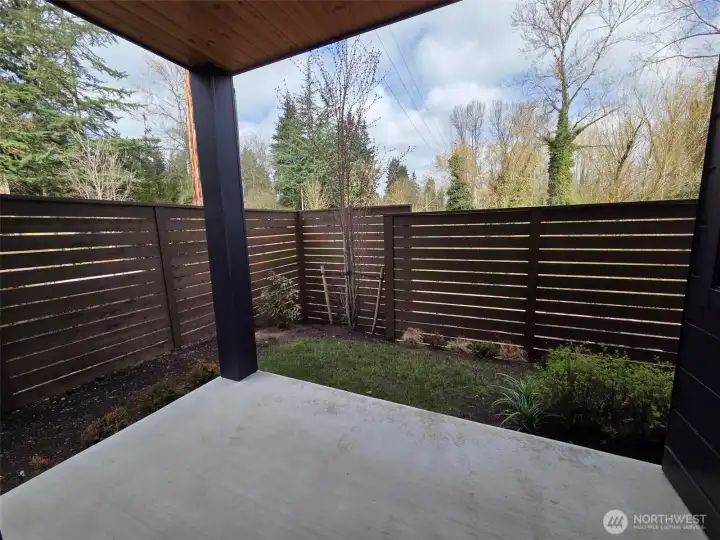 Welcoming covered patio with greenbelt views  backyard and greenbelt views. Fully fenced in backyard.