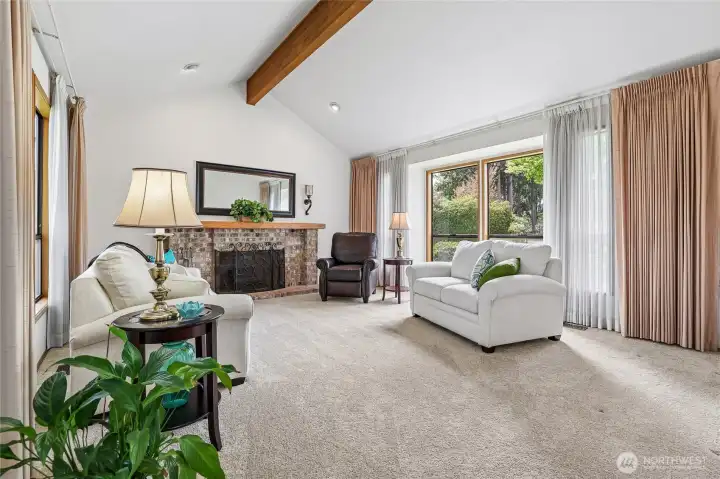 Spacious living room with large windows that flood the home with natural light from both sides.