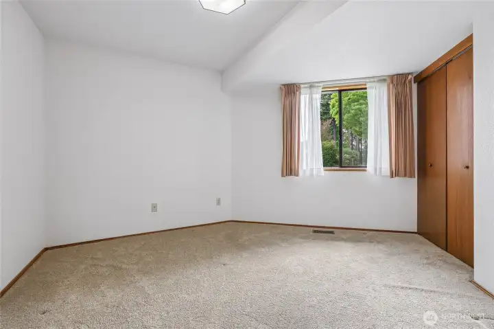 Main floor bedroom with a 3/4 bath nearby is perfect for guests or multi-gen living