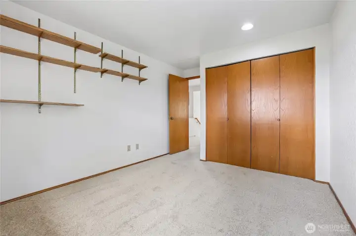Bright second bedroom—perfect for an office, craft room, or nursery.