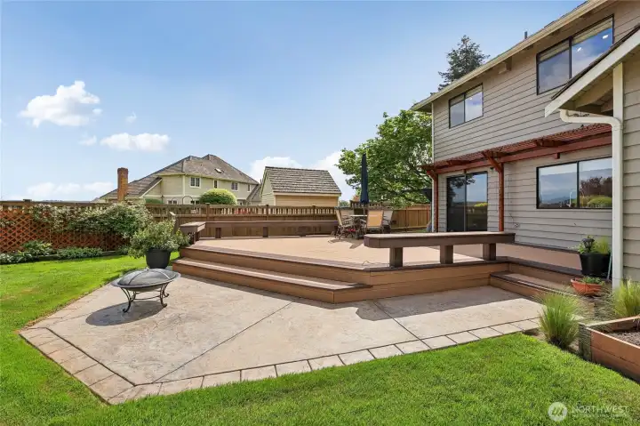 A private sanctuary: lush greenery and professional hardcaping surround the home.