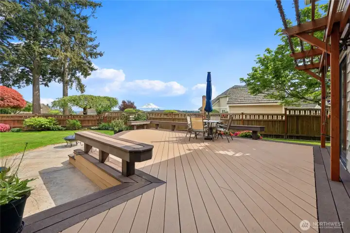 Experience the ultimate Northwest lifestyle: enjoy your morning coffee on the deck with a breathtaking, unobstructed view of Mt Rainier.