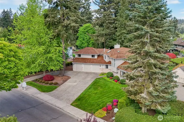 Prepared for all seasons: this home is wired for a generator and features a full underground sprinkler system.