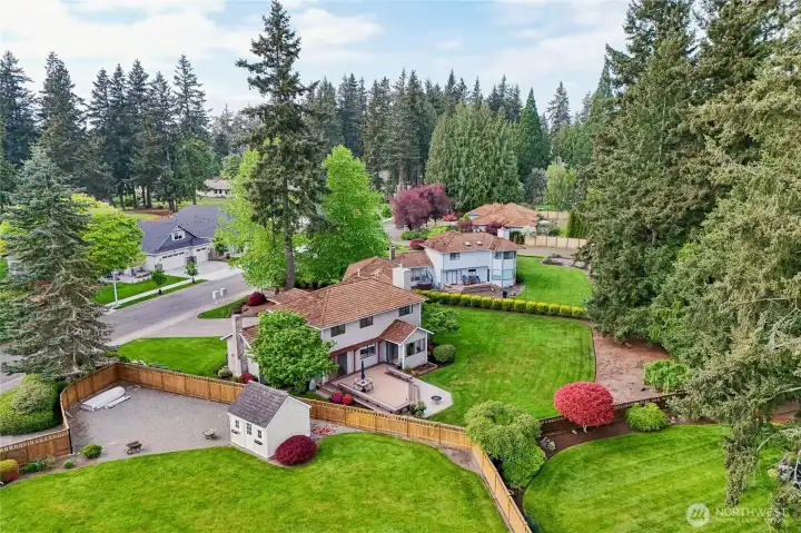 Aerial perspective of the local neighborhood and nearby natural beauty.