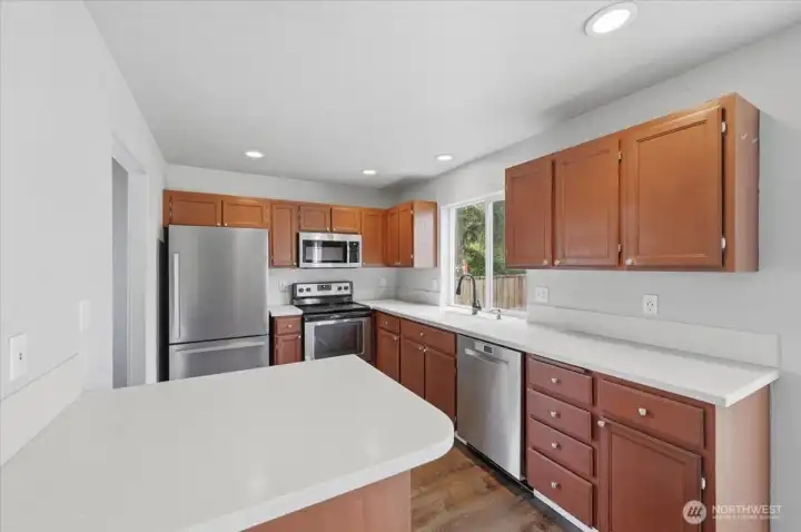Kitchen with Corian Countertops.