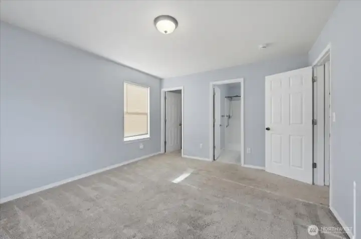 Another view of the Spacious Primary Bedroom.