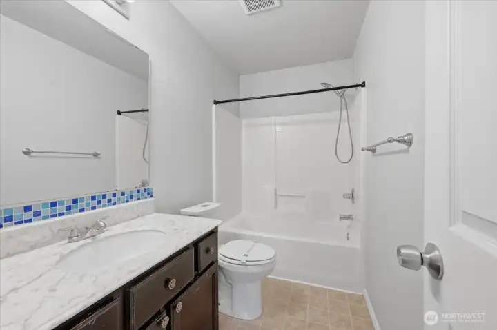 Full Bath in Hallway upstairs.