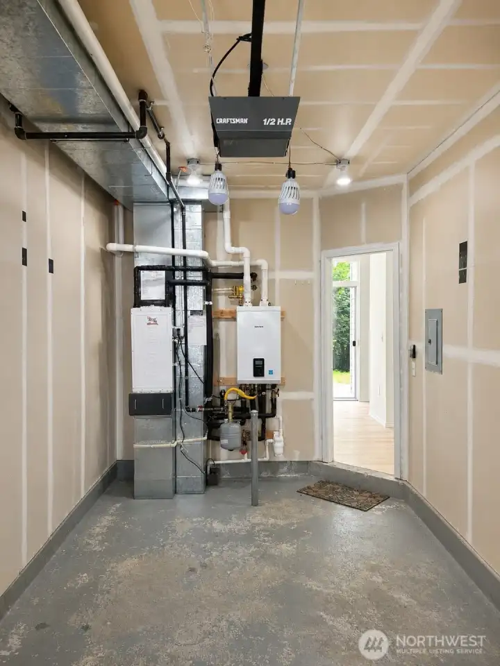 Garage with Brand New Tankless Water Heater & Furnace