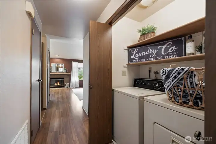 Convenient laundry tuck behind bi-fold doors between the bedrooms & bath