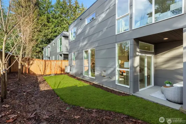 Step into a backyard oasis! This beautifully landscaped private outdoor space lets you relax and enjoy the natural surroundings. Perfect for evening gatherings or peaceful mornings with a cup of coffee.