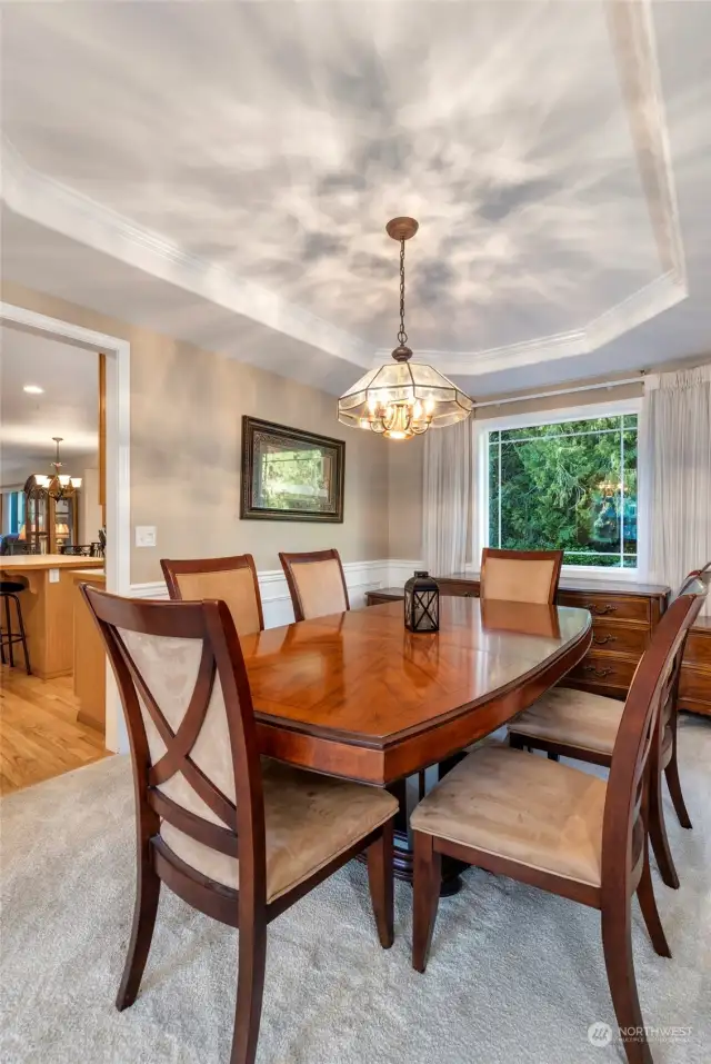 Formal Dining room area with coffered Ceiling