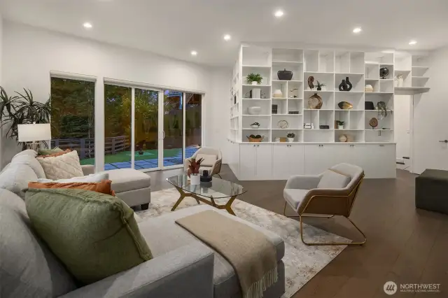 The walk-out basement includes a large media room with access to the private patio, additional two bedrooms, and two bathrooms.