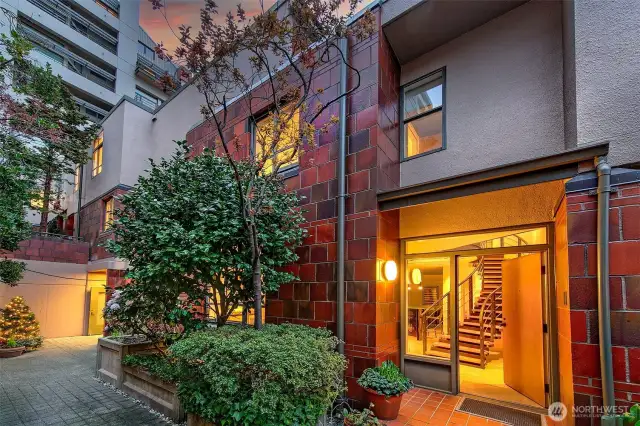 End-unit townhome, set among lush greenery!