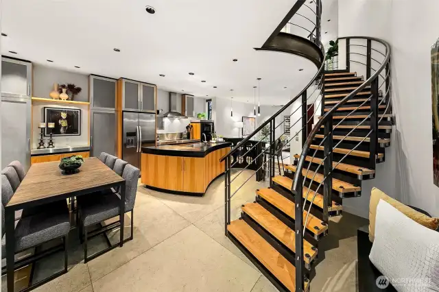 Dramatic staircase and limestone floors greet you upon entry!